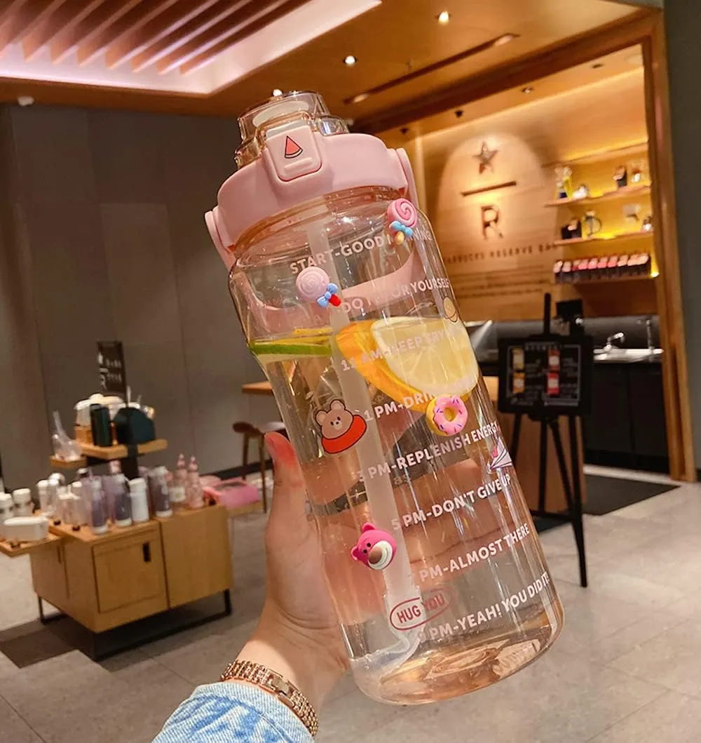 Large Kawaii Clear Gallon Water Bottle with Time Marker and Straw 70oz Kawaii Water Bottle with and Resin Stickers Portable Giant Drinking Bottle for School Sports Yoga Spill Proof Water Jug (Pink)